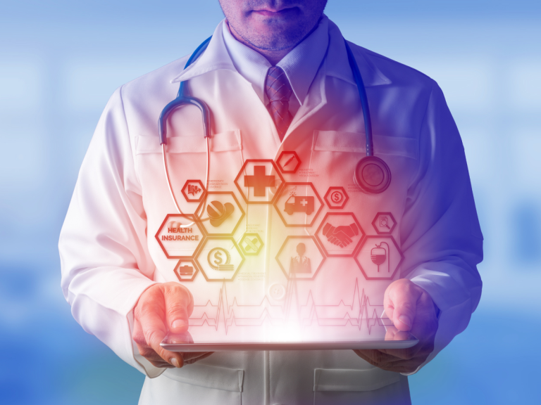 doctor holding book with health insurance icons